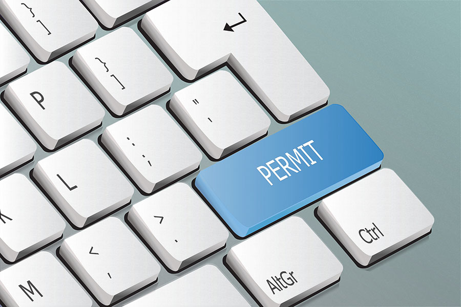 Graphic of a keyboard with an extra key that reads "Permit."