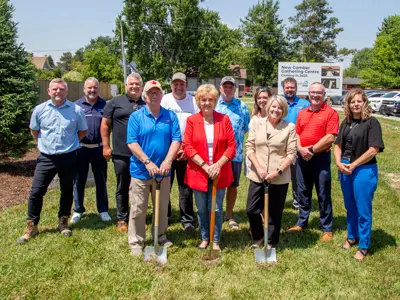 Group photo of Mayor and Council and staff with Linda McKinlay at new Linda McKinlay square